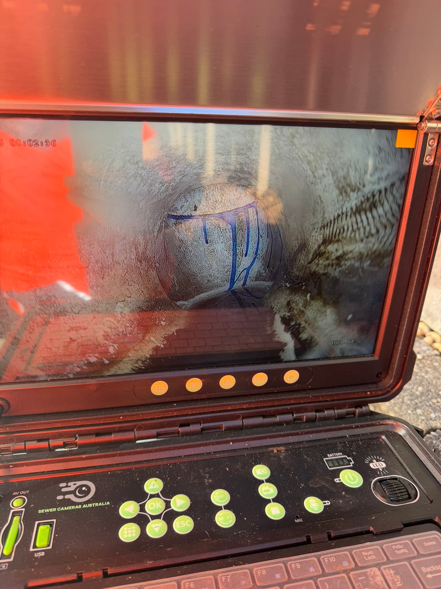 Drain camera screen showing the inside of a pipe