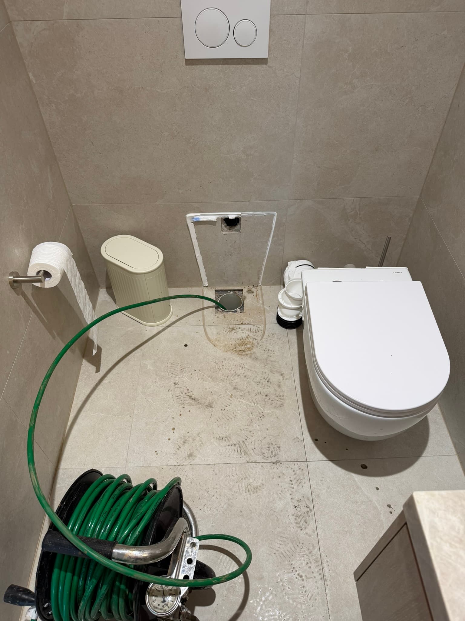 Toilet plumbing maintenance in progress